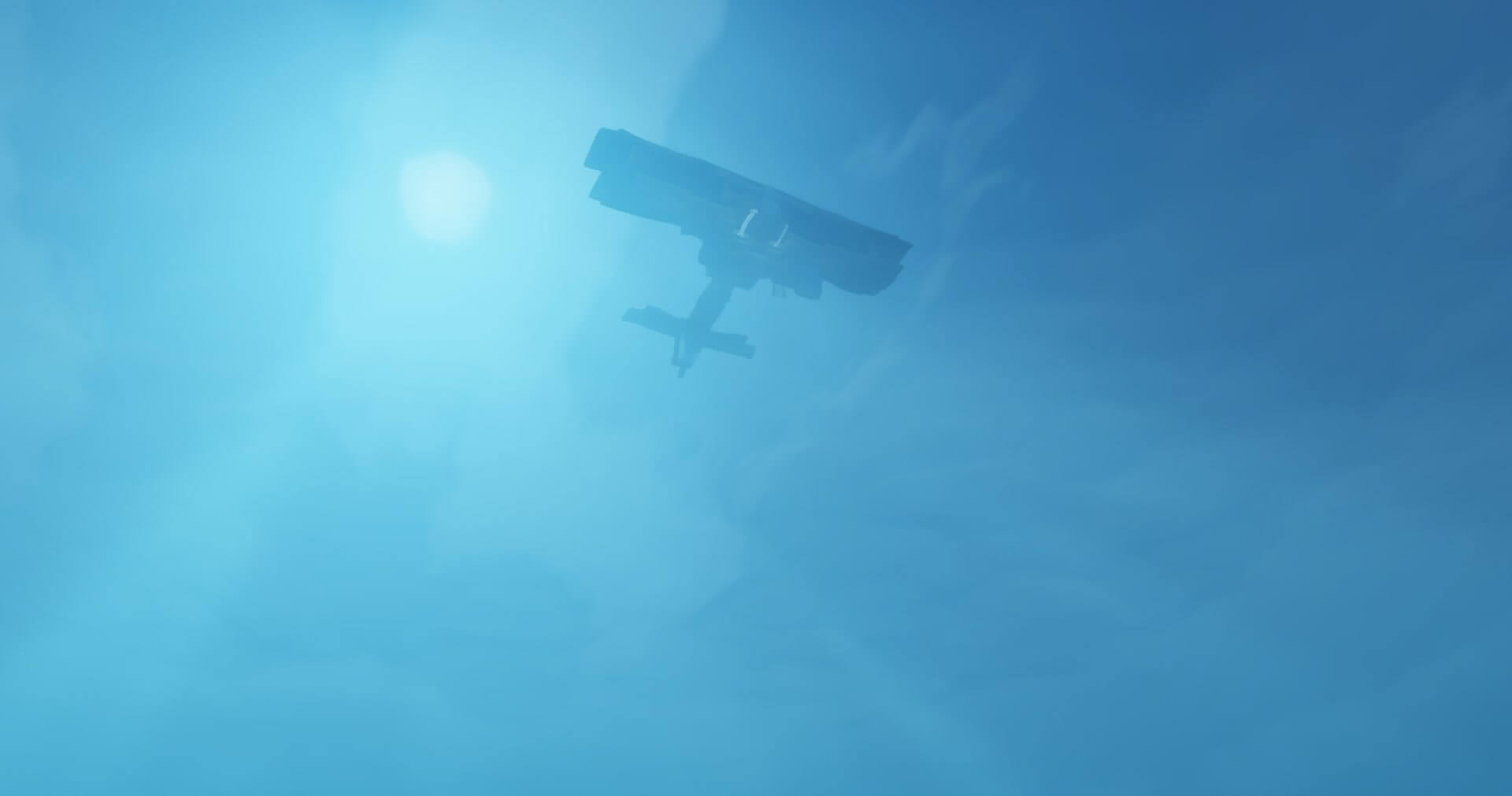 A WWI-era biplane gliding above an ocean.